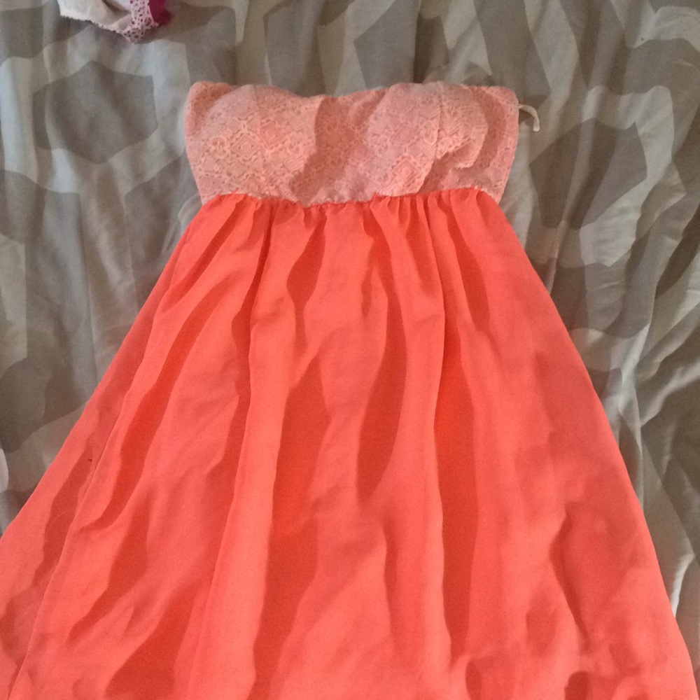 A strapless pink padded prom dress